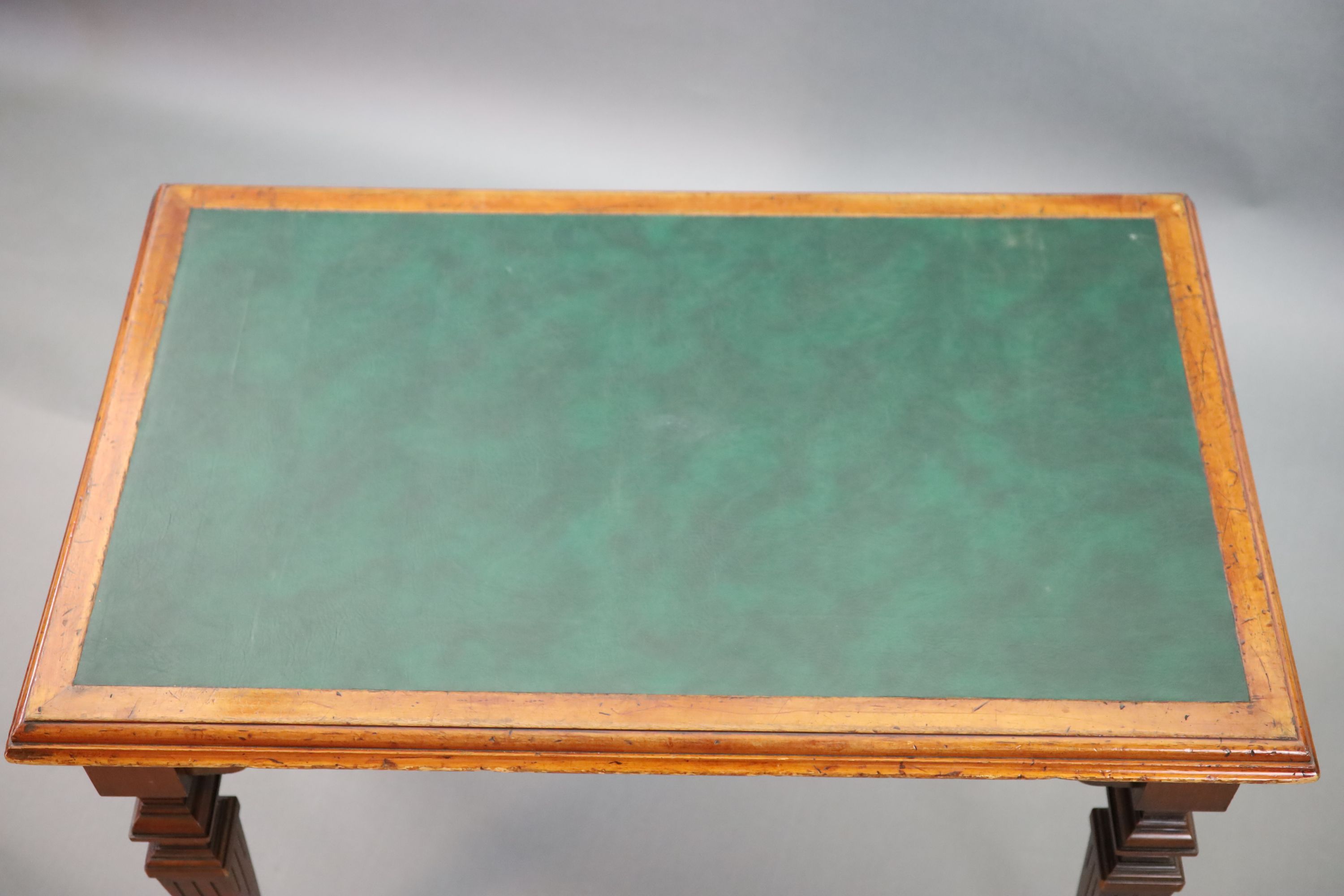 A Victorian mahogany writing table, supplied by Sage & Co. Shopfitters of London, W.112cm D.68cm H.79cm